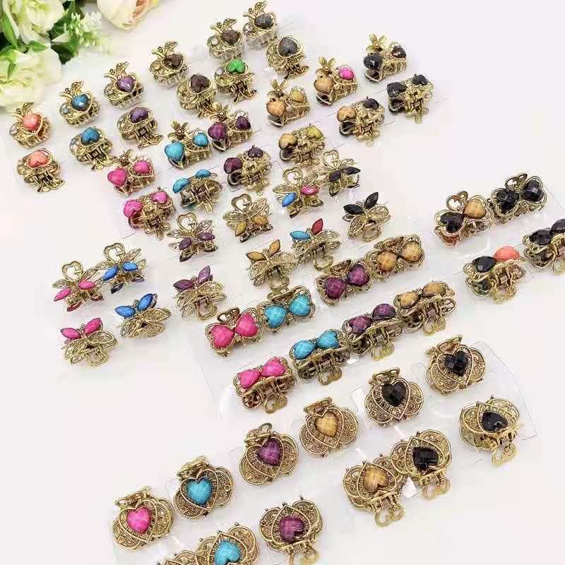 Kit com 12 unidades de mini piranha metal para cabelo