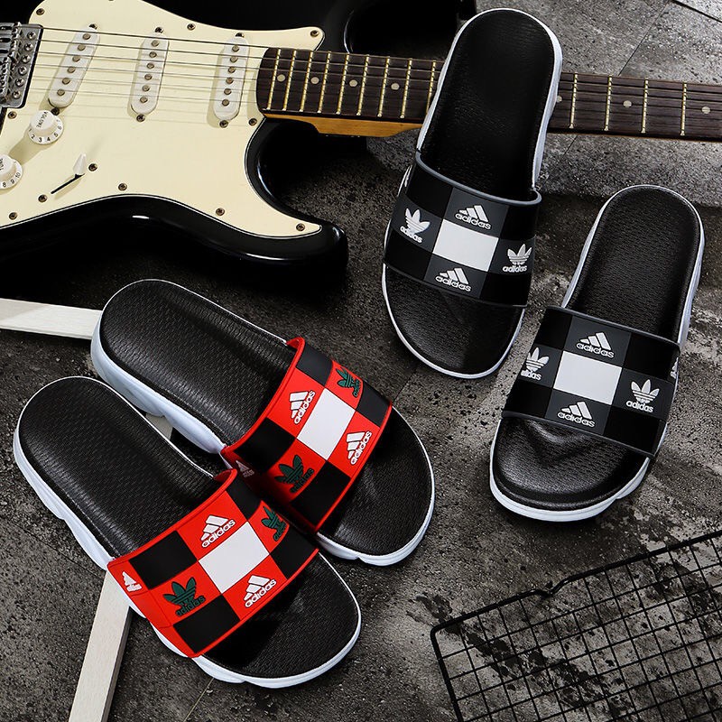 fotos do chinelo da adidas