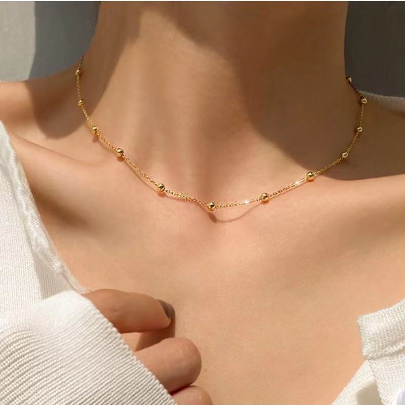 Colar Choker de Bolinhas Espaçadas Banhado A Ouro 18K