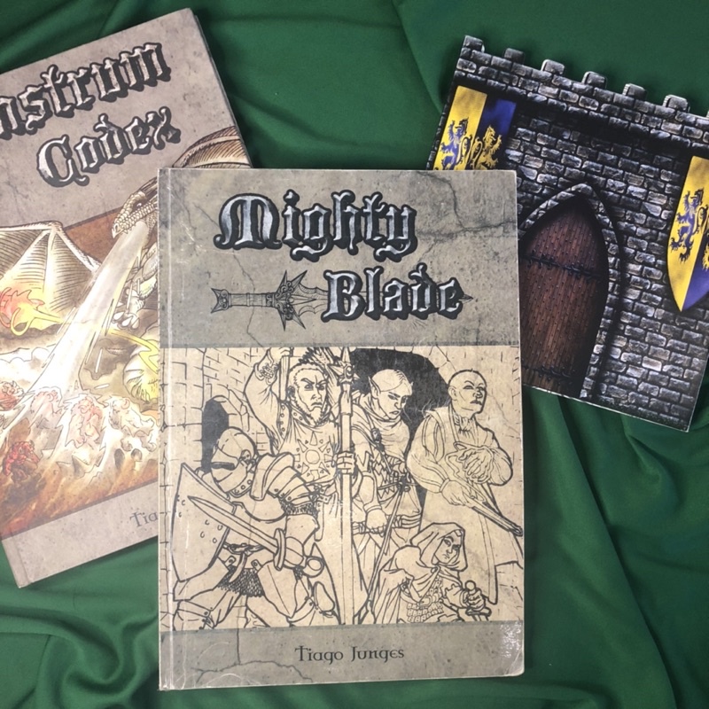 Mighty Blade - Manual Básico + Monstrum Codex + Escudo do Narrador - Tiago Junges
