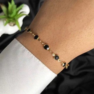 PULSEIRA COM PEDRAS PRETAS FOLHEADA A OURO 18K