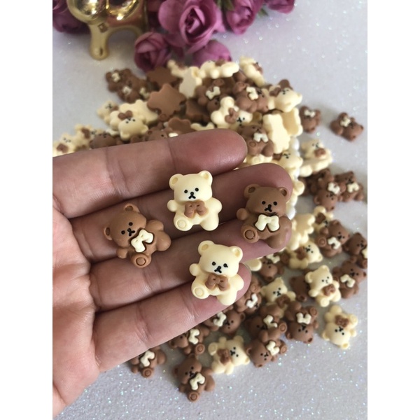 Aplique ursinho com laço 17x20mm em resina-10 unid em Oferta na Shopee