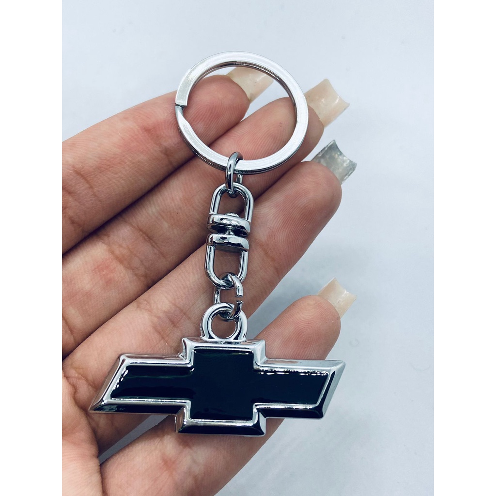 Chaveiro cromado un - Ch carro preto em Oferta na Shopee