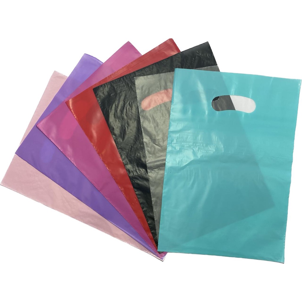 100 Sacolas Plásticas -25x35 -Material Virgem -alça Vazada Boca De Palhaço Para Loja - 0,08 Micras