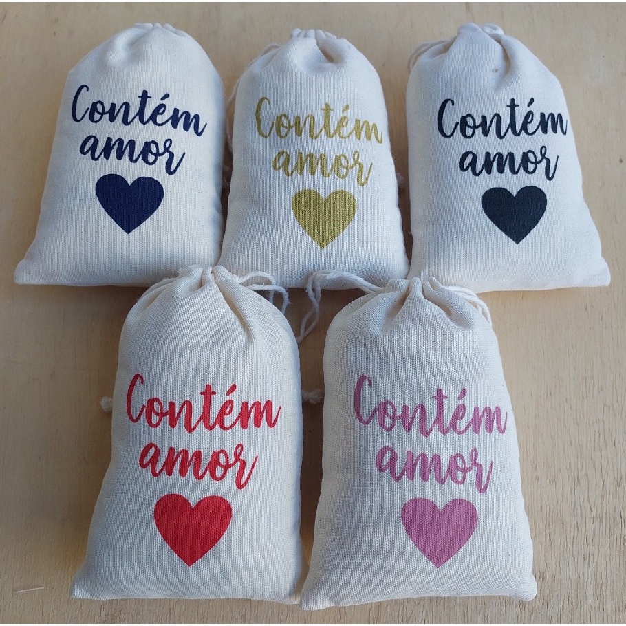 20 Saquinhos 9x12 algodão cru com a frase "Contém amor".