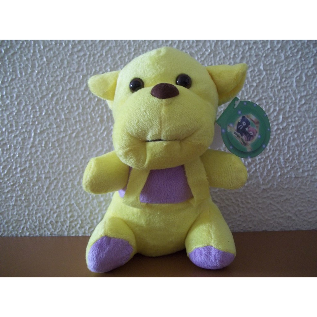 Cachorro de Pelúcia Amarelo com Suspensório