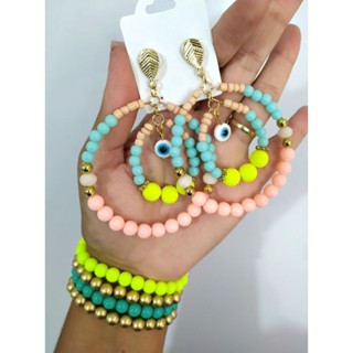 Brinco olho mais pulseiras NV