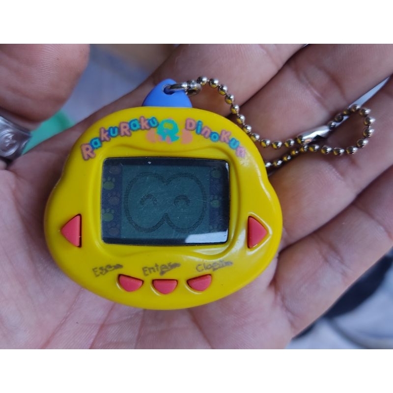 Bichinho Virtual, Tamagotchi, Rakuraku, Dinokun, amarelo