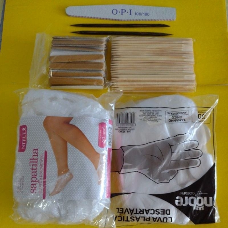 Kit manicure 50 unid de sapatilhas+ 100 und de luvas+ 100uni de palitos de laranjeira+ 100 und mini lixa. em Oferta na Shopee