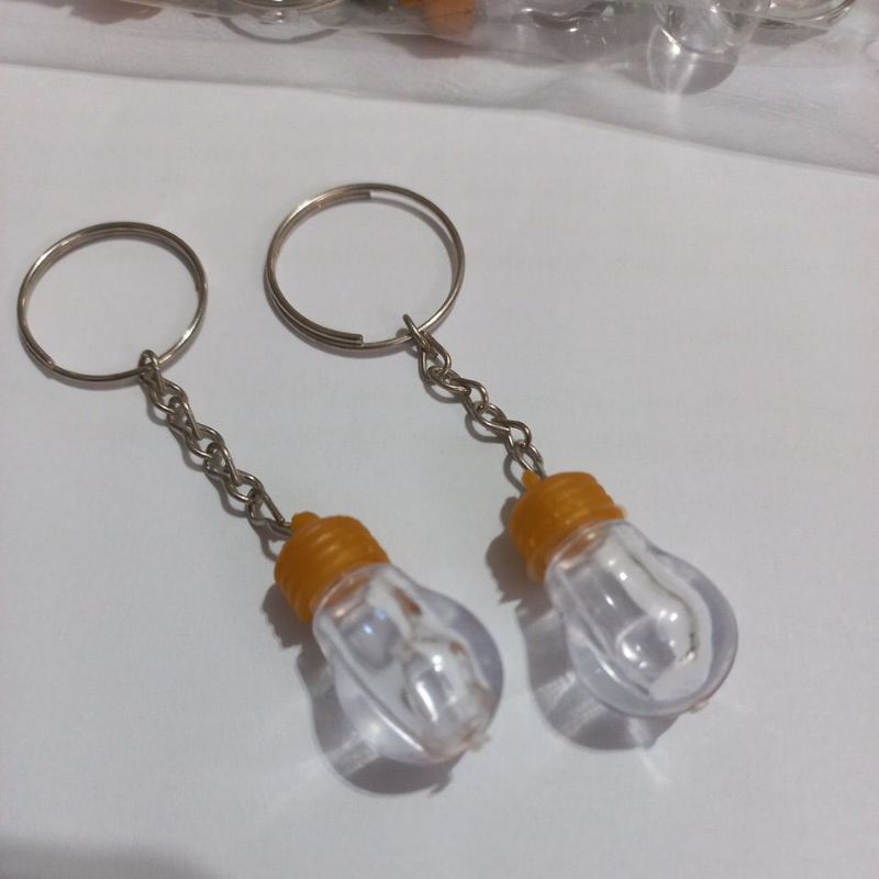 chaveiro lampada lembrancinha pacote oleo lampada pacote com 50 👉 Chaveiro Lâmpada Porta Óleo Unção Kit com 50 Peças Lem