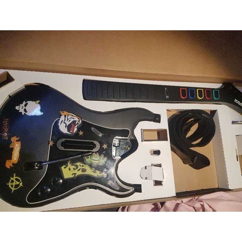Guitar hero 3 legenda of rock Playstation 2. a alavanca perdeu a molinha e não volta sozinha. Só o que está na foto.