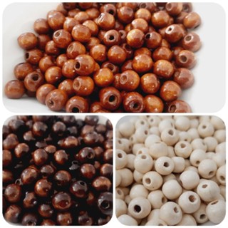 Bola passante 12mm em madeira 50un para terços bijuterias