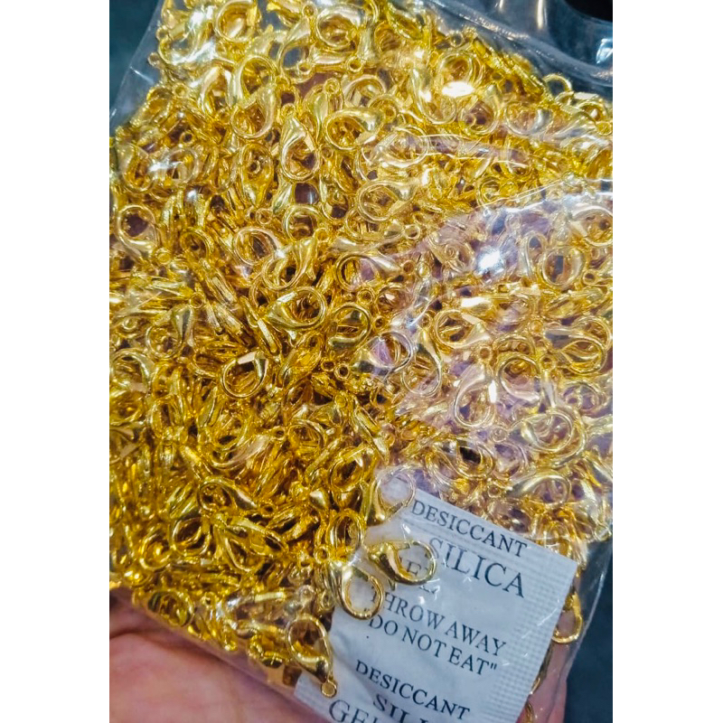 Fecho lagosta 12mm dourado/prata 100 peças