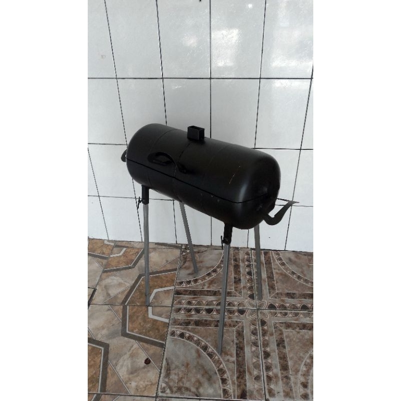 churrasqueira a bafo 25 por 57 cm feita com cilindro de ar produto reciclável e higiênico acompanha a grelha de inox 430 exclusividade da mundial grill churrasqueira