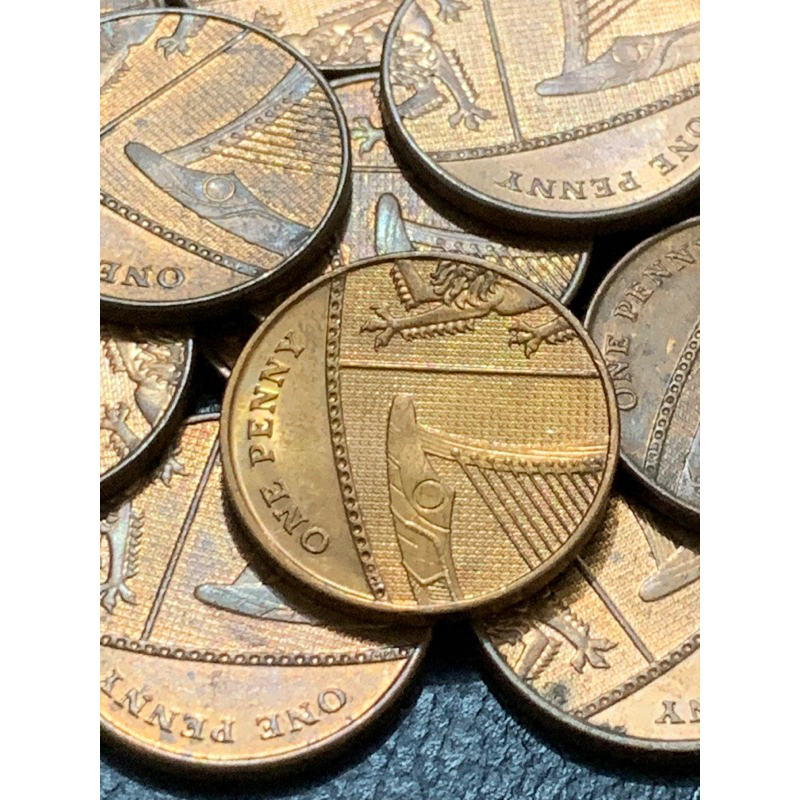 Moeda 1 pence do Reino Unido parte do escudo britânico
