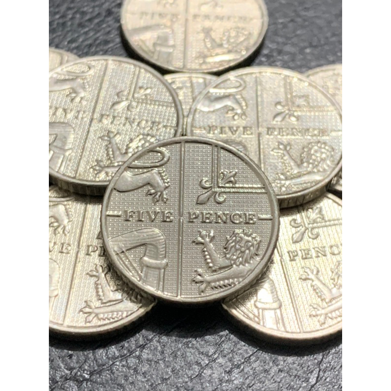 Moeda 5 pence do Reino Unido parte do escudo britânico