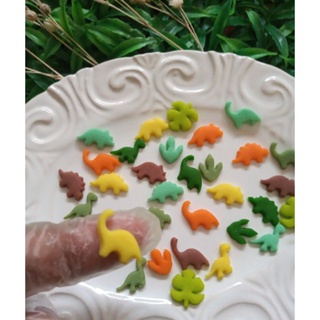 Promoção 50 ou 100 unidades Sprinkles Confeitos de açúcar Dinossauros variação paleta verde. em Oferta na Shopee