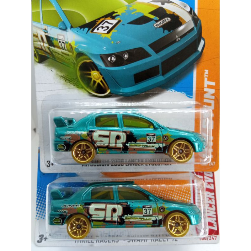 Hot Wheels Mitsubishi Lancer Evolution Thrill Racers e HW Stunt.