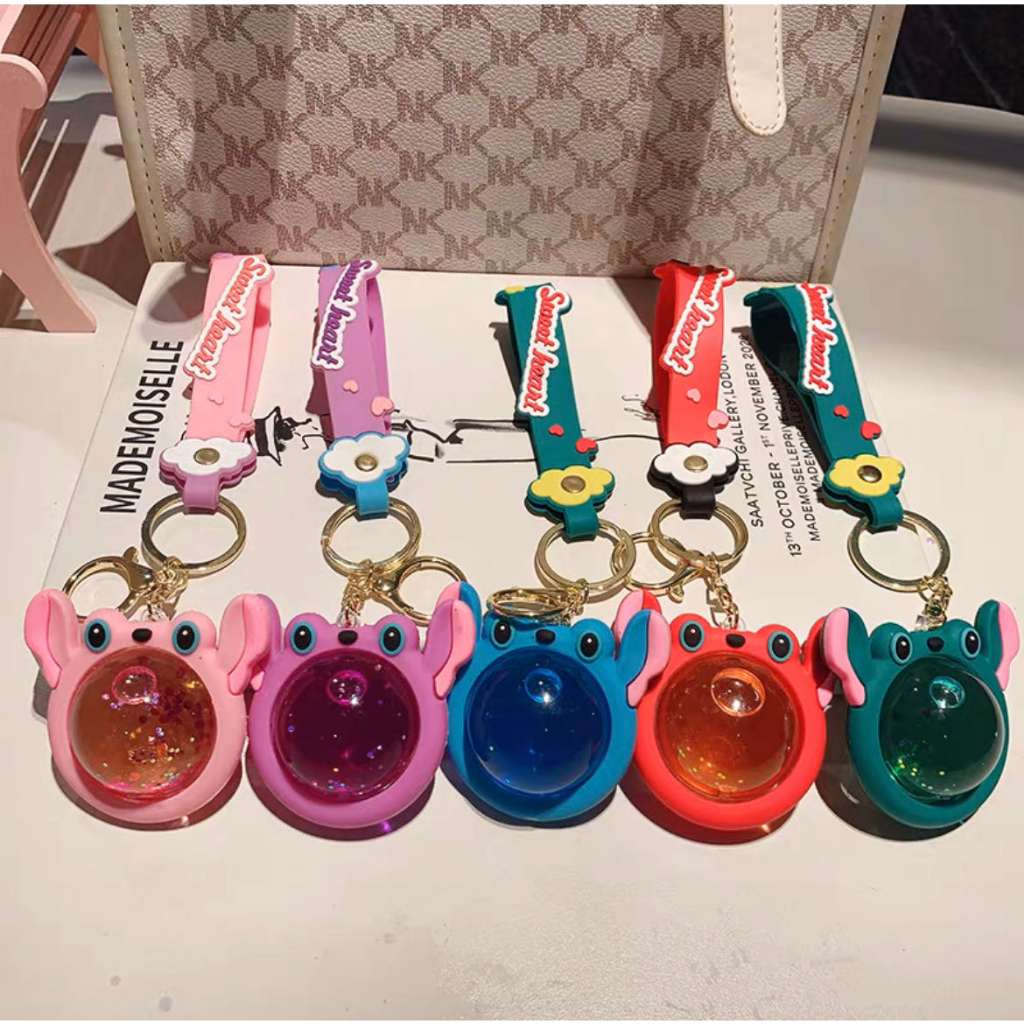 Bonito chaveiro animal com agua de desenho animado pequeno presente(envia aleatória)