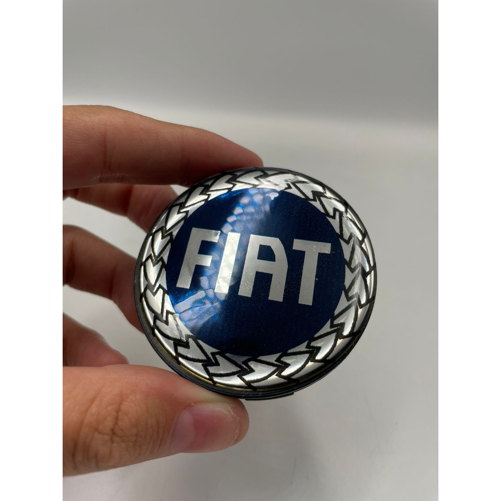 Carlota Scorro Centro Tampa Roda Fiat Palio Idea Uno Azul