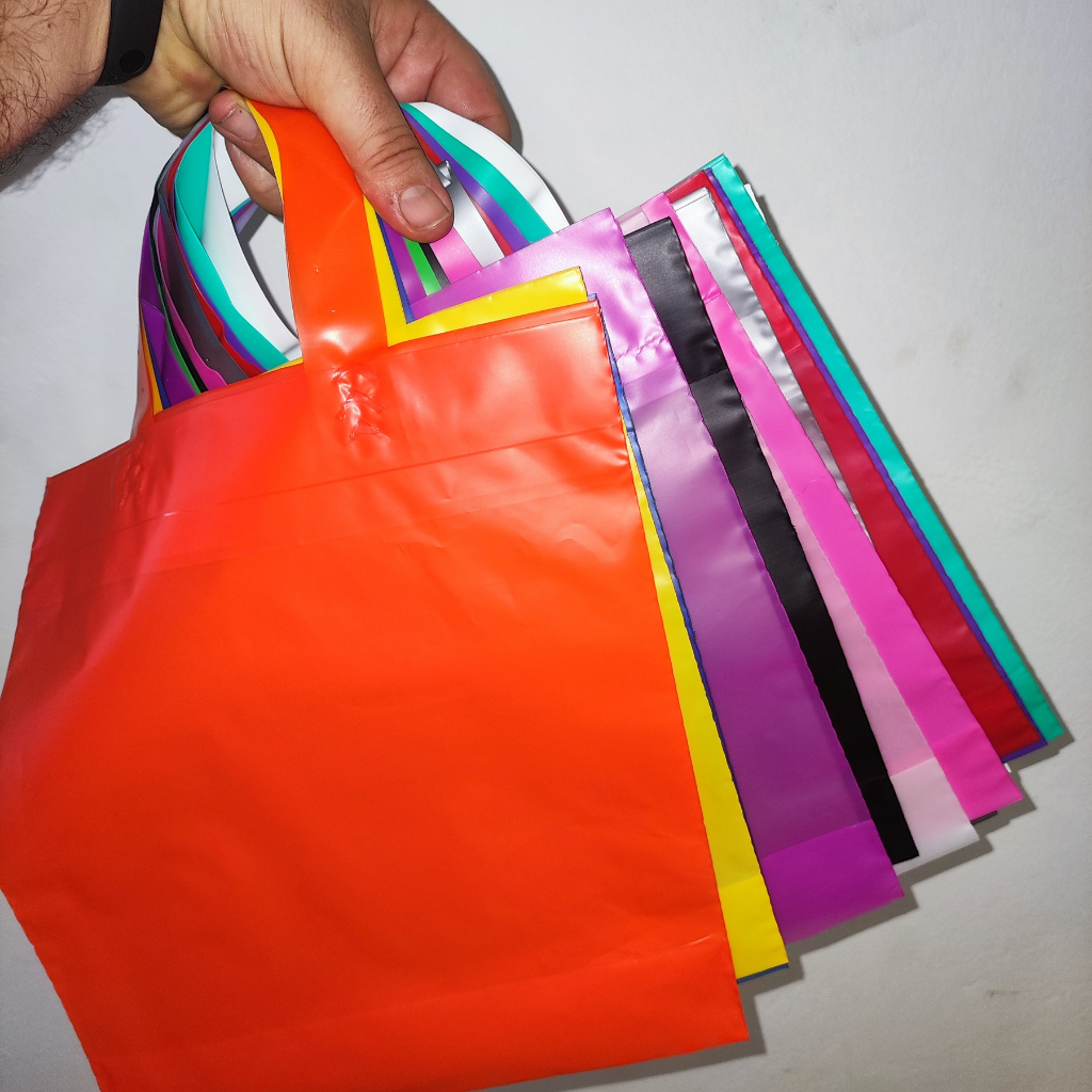 kit com 25 Sacolas plásticas Alça Fita  tamanhos 27x30 , 30x35 e 40x40  em Alta Densidade para lojas em Oferta na Shopee
