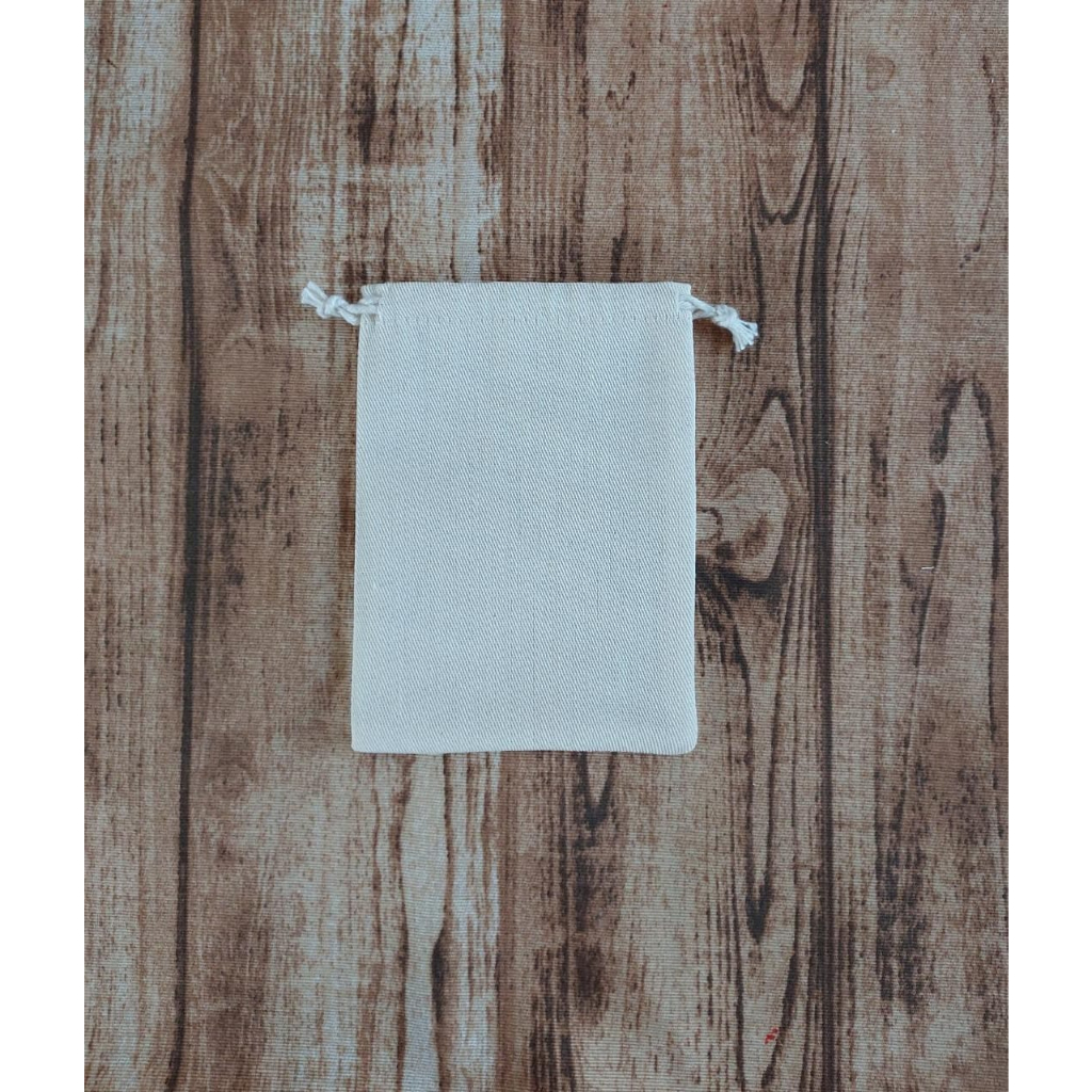 100 Saquinhos 15x15 em algodão cru.