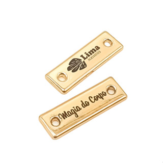 Etiqueta tag personalizada 2.4×0.8 cm de metal com furos laterais 10 unidades Douradas