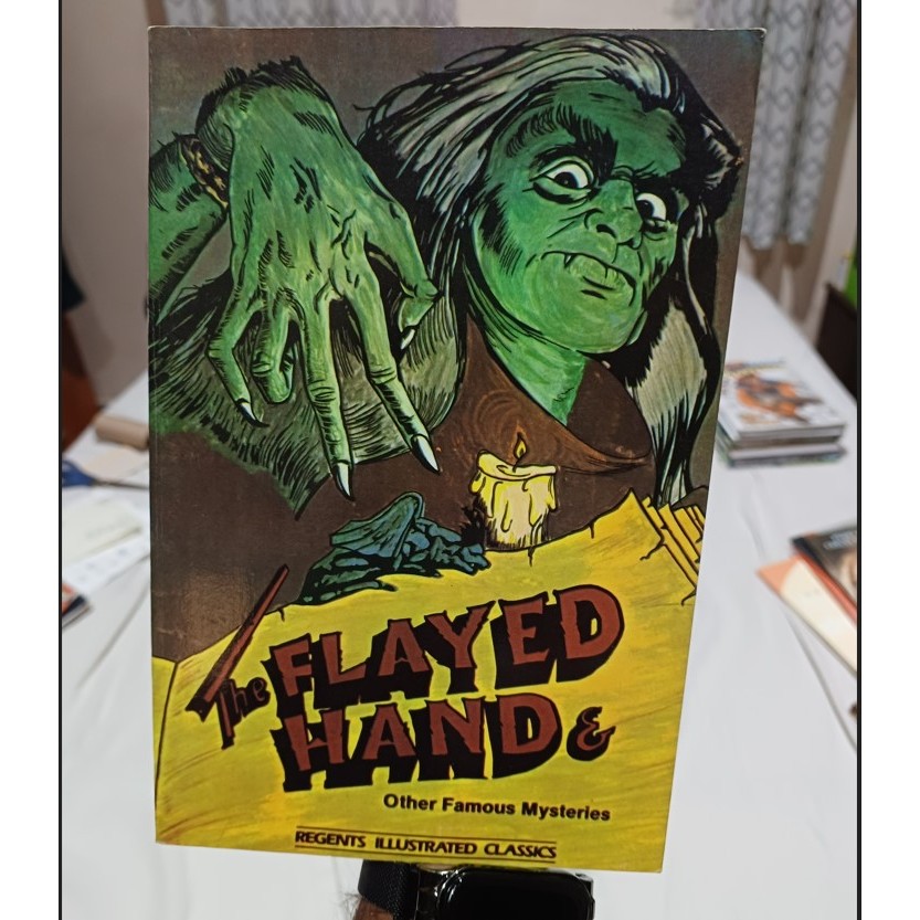 Livro para ajudar a aprender inglês: The Flayed Hand & other famous mysteries