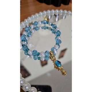 Pulseira de Silicone com Miçangas de Cristais e Pérolas Orixá Iemanjá com Pingente de Abebé