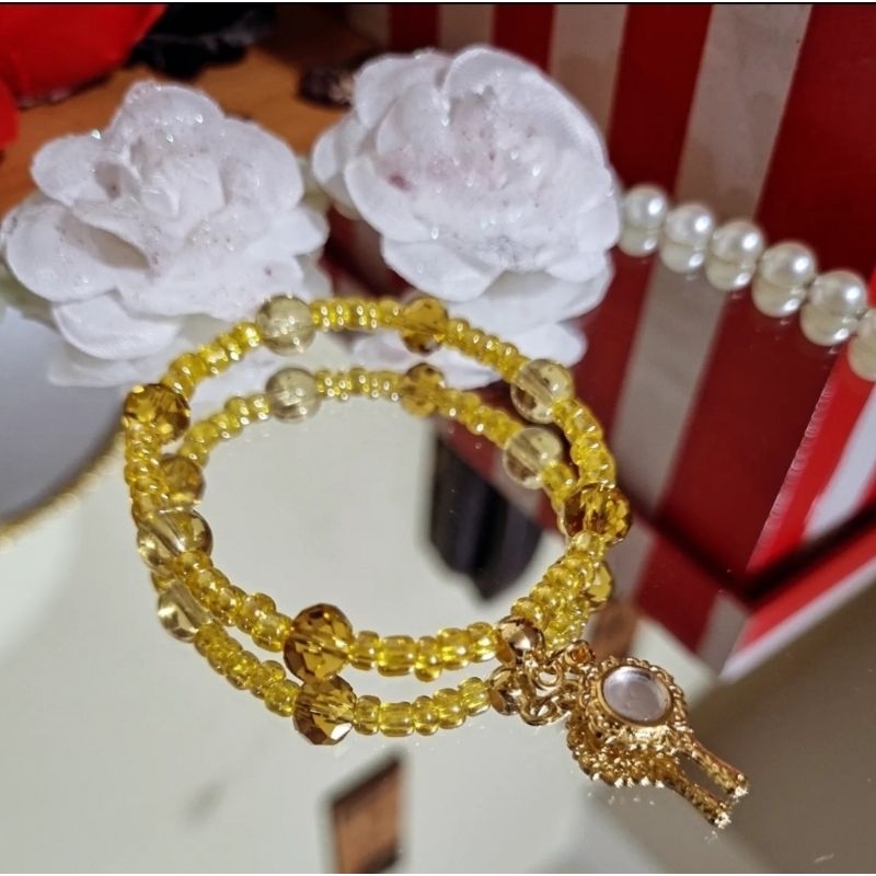 Pulseira Orixá Oxum com Abebé em Oferta na Shopee