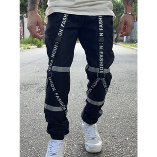 Calça Gringa Faixa Preta Jogger Larga Rapper Trapper Corta Vento 100% poliester