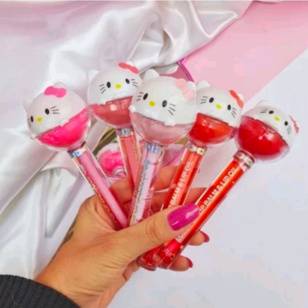 O Lip Gloss Balm 2 em 1 Hello Kitty com glitter HUDA PERFECT 2217