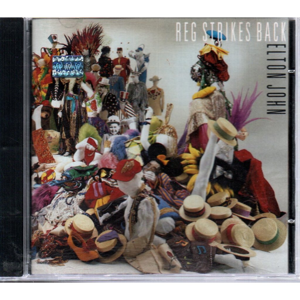 CD ELTON JHON - REG STRIKES BACK ( NACIONAL ) ROCKET RECORD 1988