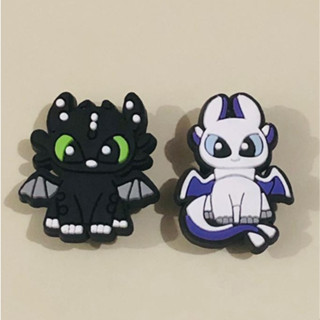 02 Pins Jibbitz de Crocs e Babuches Banguela e Fúria da Luz