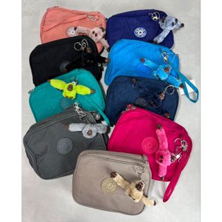 Estojo Kipling 100 pens escolar impermeável importado acompanha chaveiro de macaco