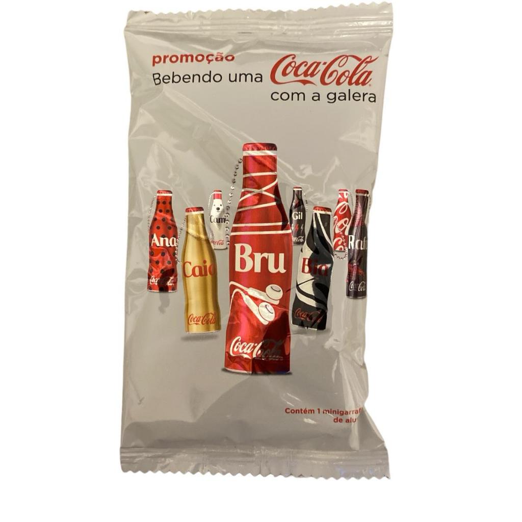 Envelope Lacrado Com 01 Mini Garrafinha Coca Colecionavel