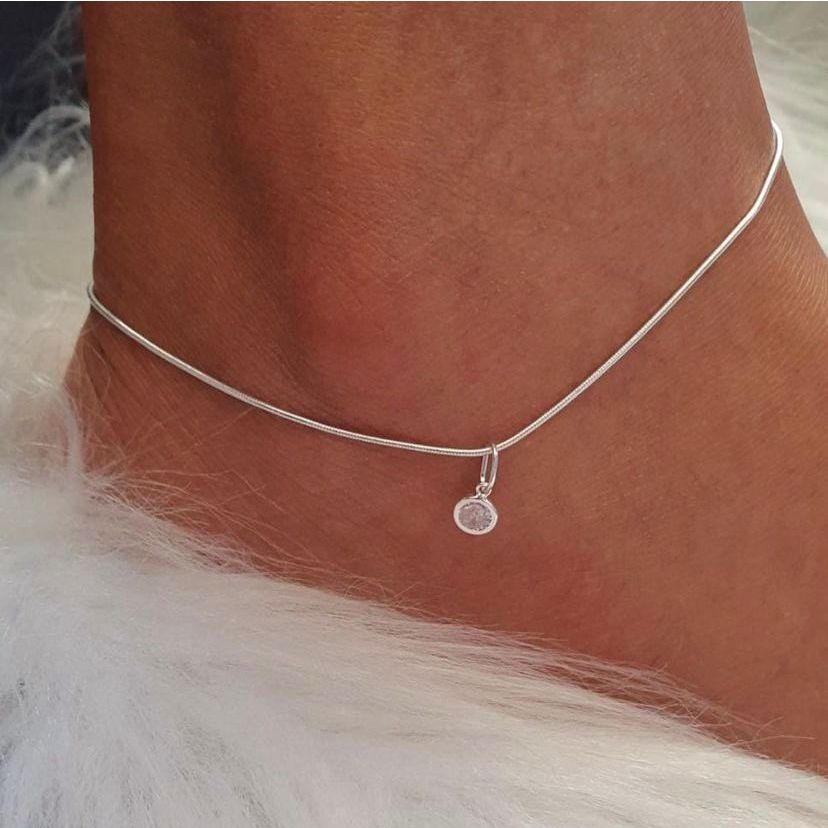 Tornozeleira ponto de luz folheado a prata 925 e ouro 18k