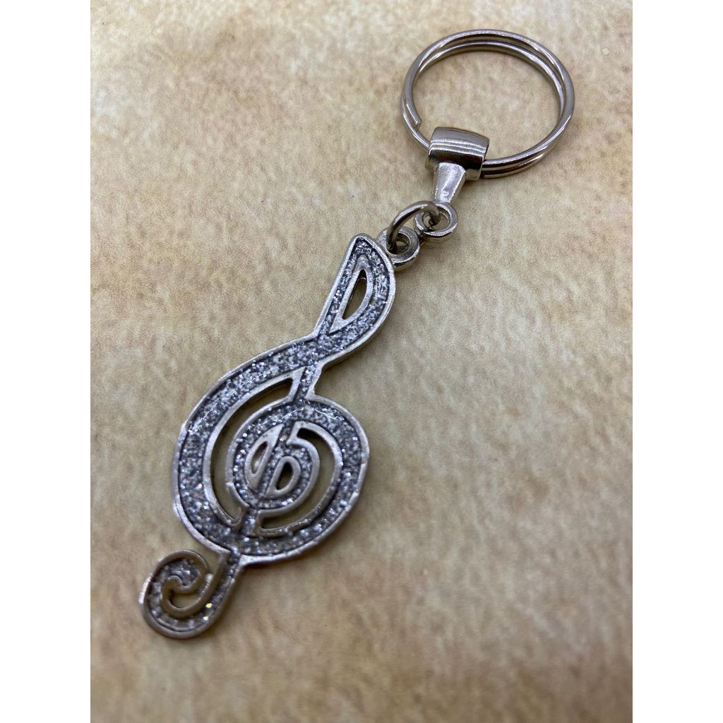 Chaveiro Clave de Sol em Metal Com Glitter Nota Musical