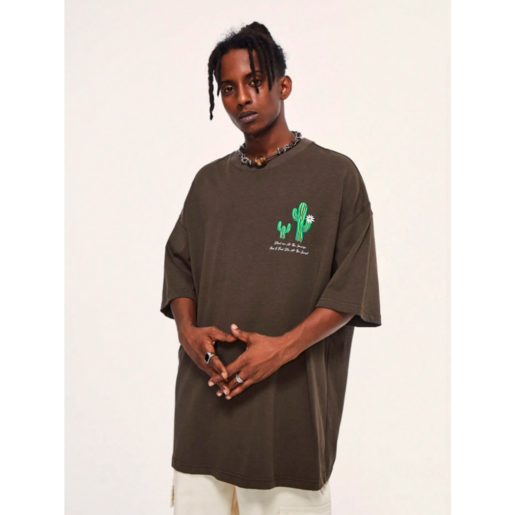 Camiseta Oversized Confortável Estilosa Cor Marrom Estampada Cacto Frase Motivacional Old School St