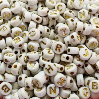 MIÇANGA LETRA Aprox. 1200 UNID. Passante REDONDA ACHATADA BRANCO E DOURADO em Oferta na Shopee