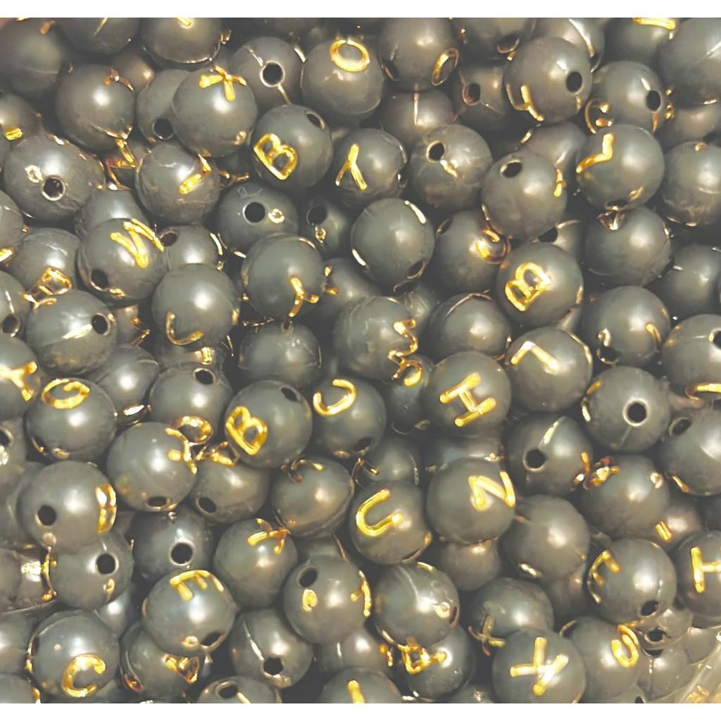 MIÇANGA INFANTIL LETRAS PRETA COM DOURADO FORMATO BOLA Aprox. 800 UNID.
