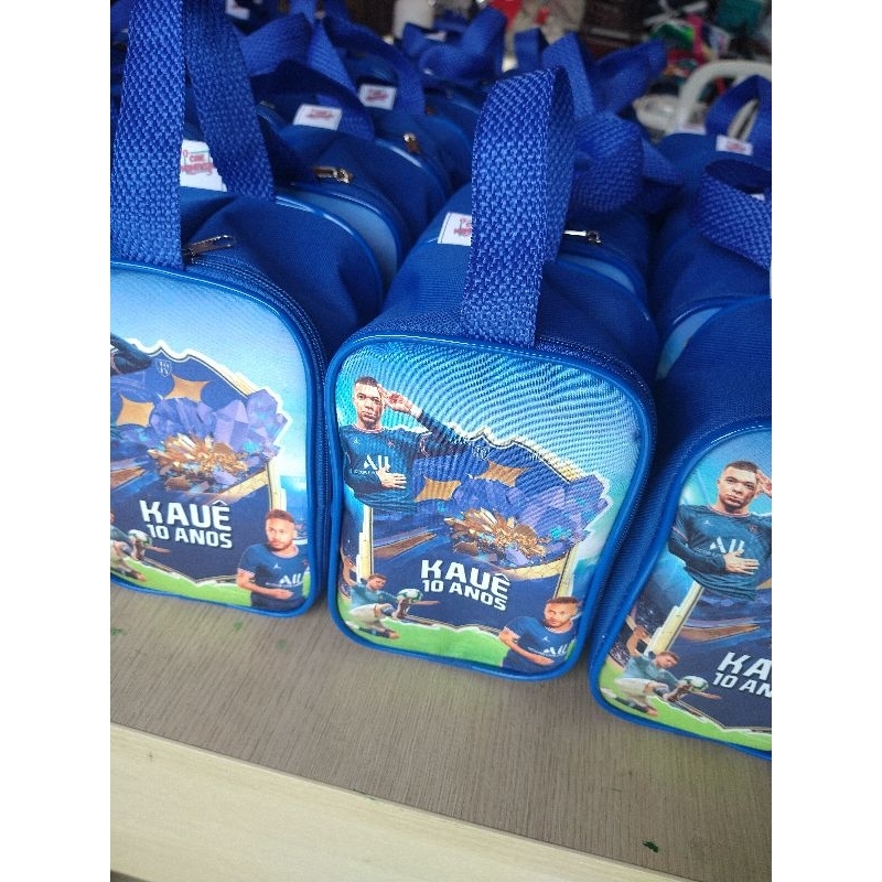 Necessárie alça temas futebol, Barbie, Moana, Sonic