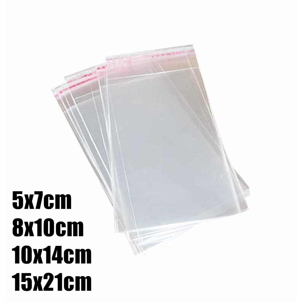 SACO CELOFANE ADESIVO SAQUINHO C/100 UNIDADES TRANSPARENTE C/ ABA (5X7/8X10/10X14/15X21) em Oferta na Shopee