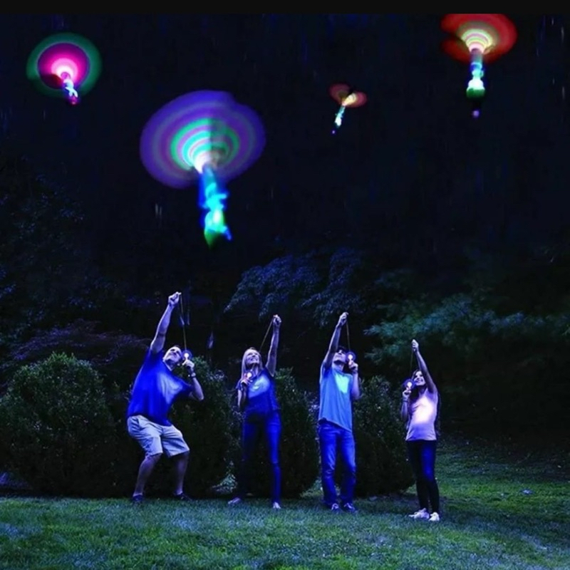 Brinquedo Led Voador Foguete Helicóptero Avatar Lumino Estilingue Flecha