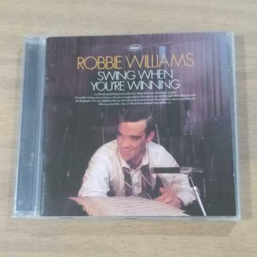 CD- ROBBIE WILLIAMS -SWING WHEN YOU`RE WINNING