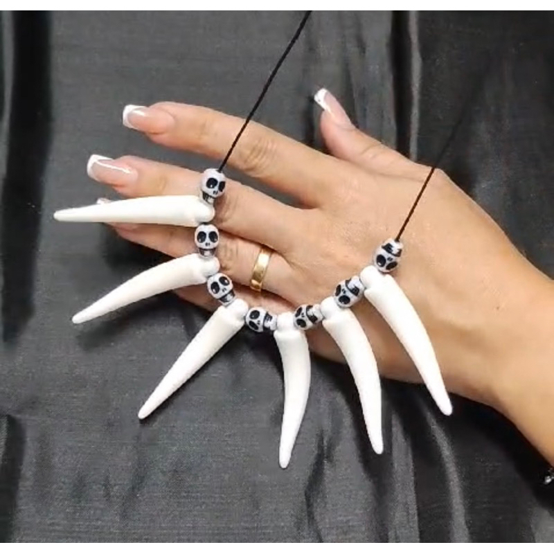 Colar do Homem e da Mulher das Cavernas com Dentes e Ossos em Plástico - Fantasia Carnaval Halloween
