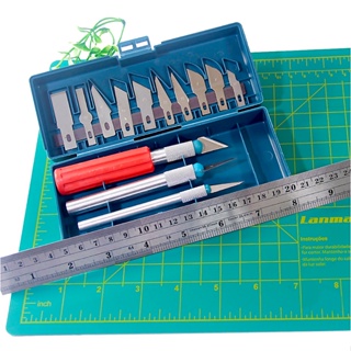 Kit Estilete Bisturi + Base Corte A4 Lanmax + Régua Aço 30 CM em Oferta na Shopee