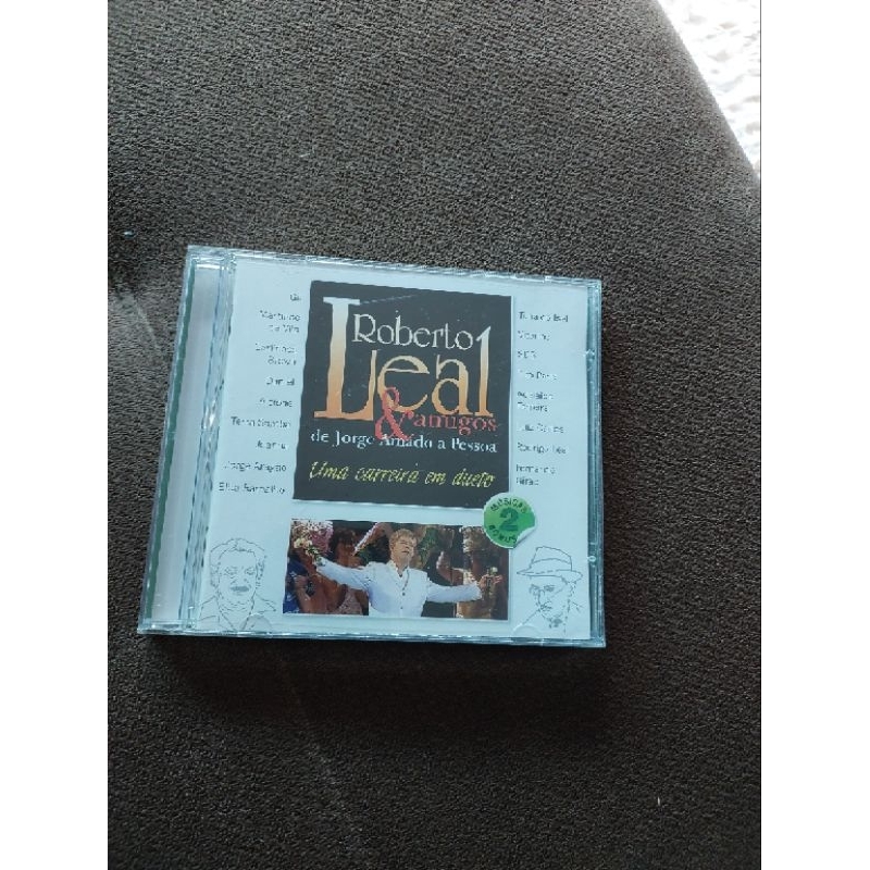 CD ROBERTO LEAL E AMIGOS DE JORGE AMADO A PESSOA EM PERFEITO ESTADO DE CONSERVAÇÃO APROVEITE