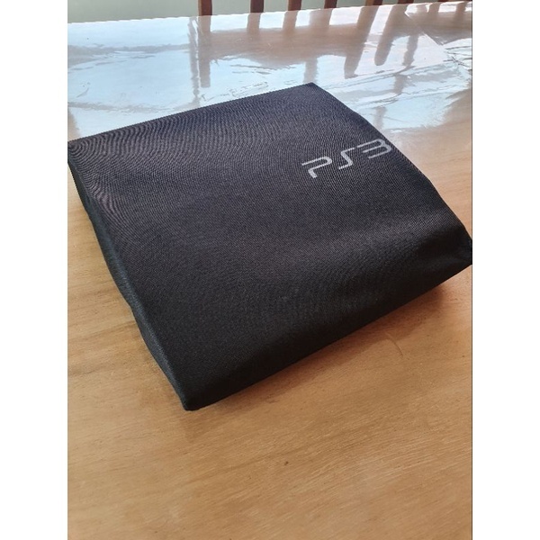 Capa anti-poeira Compatível  para videogame ps3 slim /ps3 superslim segue o formato do aparelho na parte da frente em Oferta na Shopee