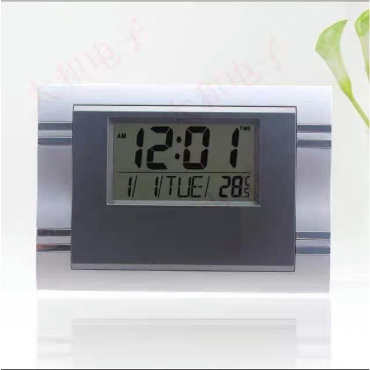 Relógio 19,5x14 Digital Pilha De Plástico Com Visor De Cristal Com Suporte Para Mesa Prático E Útil em Oferta na Shopee